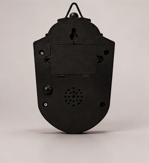 Back of the Eyeball Doorbell showing the battery compartment, speaker and keyhole slot