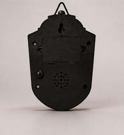 Back of the Eyeball Doorbell showing the battery compartment, speaker and keyhole slot