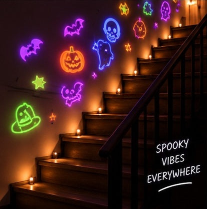 Halloween shapes projected along a staircase wall - spooky vibes everywhere